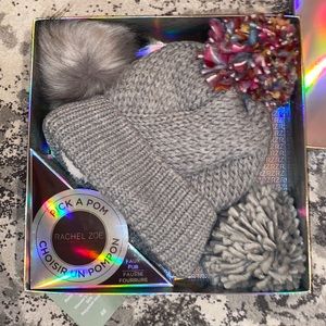 Interchangeable Pom hat. In the box great gift!